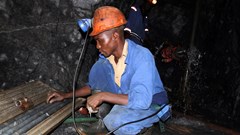A Zimbabwean miner works underground at Metallon Gold mine in Shamva, about 80 km north of the capital Harare, June 14, 2011. Reuters/Philimon Bulawayo/File Photo