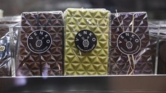 Artisanal chocolate bars are seen on display at Venko Chocolatier in Dakar, Senegal, July 6, 2021. Source: Reuters/Cooper Inveen