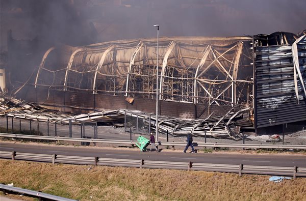 Brookside Mall burns after being looted. Source: Reuters/Rogan Ward