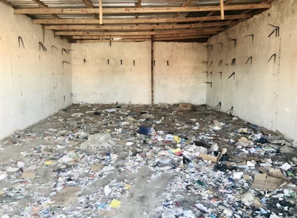 An immigrant spaza shop in Tsakane was stripped bare. In addition to the food stocks, everything was looted, including shelves, fittings and fridges. Photo: Kimberly Mutandiro