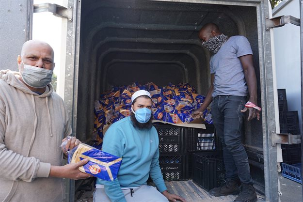 Milk and bread loaded into a vehicle to deliver to the needy in the Umgeni Road area in Durban.