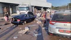 Demonstrators loot the Ayoba Cold Store as protests continue, following imprisonment of former South Africa President Jacob Zuma, in Chesterville, Durban, KwaZulu-Natal, South Africa 12 July 2021, in this still image obtained from social media video. Siphiwe Emacous Moyo Snr/via Reuters