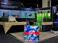Scan Display halves its exhibition stand costs at Madex 2018