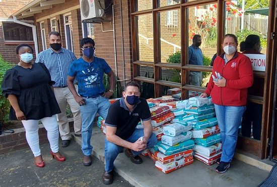 The Sappi Forests team hand over nappies to Paula Robinson from Salvation Army