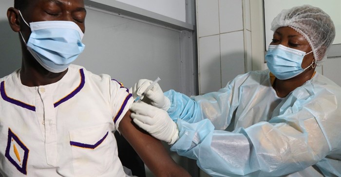 A health worker receives a vaccine against Ebola at a hospital after a case of Ebola was confirmed in Abidjan, Ivory Coast 16 August 2021. Reuters/Luc Gnago