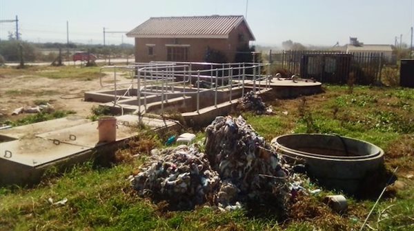 Objects flushed into the sewers that clog the system stand in heaps at the pump station in Valencia, Addo. | Photo: Joseph Chirume