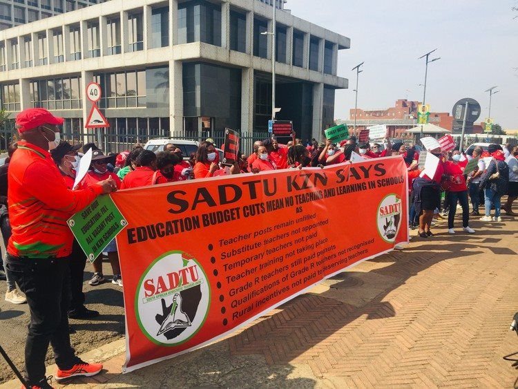 Members of the South African Democratic Teachers Union picket outside to the provincial legislature in Pietermaritzburg on Tuesday. They are demanding that the education department pay them and fill vacant teacher posts. Photo: Nompendulo Ngubane / GroundUp