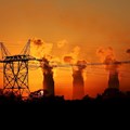 Electricity pylons are seen in front of the cooling towers at the Lethabo Thermal Power Station,an Eskom coal-burning power station near Sasolburg in the northern Free State province, 2 March 2016. Reuters/Siphiwe Sibeko/File Photo