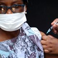 A healthcare worker administers the Johnson and Johnson coronavirus disease (Covid-19) vaccination to a woman in Houghton, Johannesburg, South Africa, 20 August, 2021. Reuters/ Sumaya Hisham/File Photo