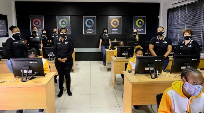 The e4 team at the Diepdale Secondary School Computer Centre, one of the schools participating in the e4 Stem Programme. | Source: Supplied.