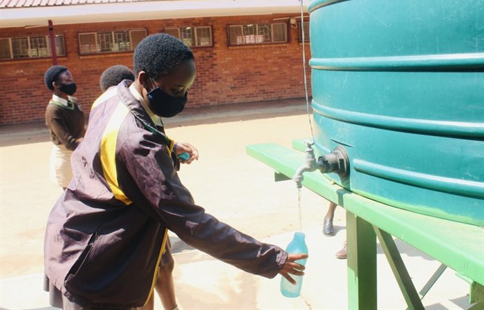 Learners at Ratshepo High School in Temba rely on water trucked-in every second week for drinking and cooking. The community of Hammanskraal wants the government to find a permanent solution to the water crisis in the area. | Source: Mosima Rafapa