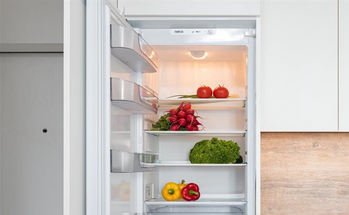 A designated shelf in the fridge can help reduce food waste. | Source: