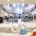 A view shows damage inside a shopping mall following protests that have widened into looting, in Durban, South Africa 13 July 2021, in this screen grab taken from a video. Courtesy Kierran Allen/via Reuters