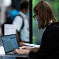 A woman works with a computer at the Technology trade show VivaTech in France, Paris, on 17 June 2021. Xose Bouzas / Hans Lucas 
Source: Reuters