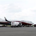 A Boeing 737-7BD Arik Air aeroplane is seen parked on the tarmac at the local airport in Lagos, file. REUTERS/Akintunde Akinleye/File Photo
