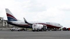 A Boeing 737-7BD Arik Air aeroplane is seen parked on the tarmac at the local airport in Lagos, file. REUTERS/Akintunde Akinleye/File Photo