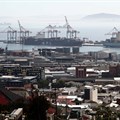 Container ships wait to load and offload goods in Cape Town, South Africa, April 17, 2020. REUTERS/Mike Hutchings/File Photo