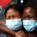Source: REUTERS. Vuhlari Mtonga, one of the South African medical students who fled Ukraine, is embraced by her sister, Mikateko Mtonga, after arriving at OR Tambo International Airport in Johannesburg in March 2022.