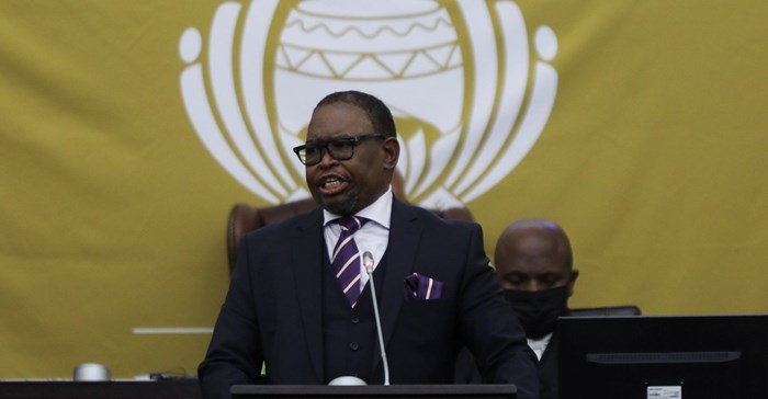 Source: REUTERS/Shelley Christians. SA's Finance Minister, Enoch Godongwana presents his 2022 budget speech in Cape Town this year.