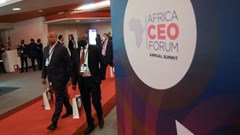 Source: REUTERS/Luc Gnago. Participants walk during the Africa CEO Forum at the Sofitel Hotel Ivoire in Abidjan, Ivory Coast June 13, 2022.