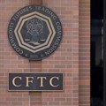 Signage is seen outside of the US Commodity Futures Trading Commission (CFTC) in Washington, DC, US, 30 August 2020. Reuters/Andrew Kelly