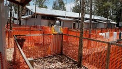 An Ebola survivor who works as a nurse, waits to receive tubes for taking blood samples at the Ebola treatment centre in Katwa, near Butembo, in the DRC, 3 October 2019. Reuters/Zohra Bensemra