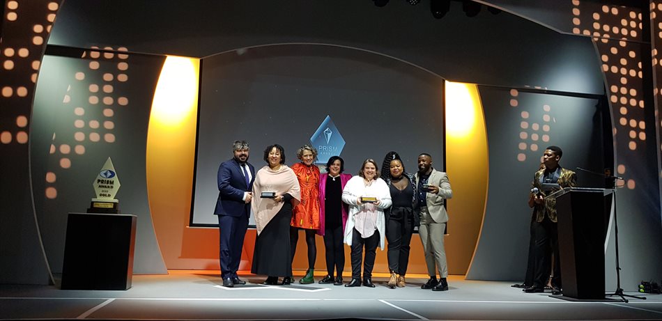 From left to right, from Flow’s Richard Frank, Edwina van der Burg, Allison MacDonald, Tiffany Turkington-Palmer and Tara Turkington with gold and silver Prism awards