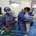 Source: Reuters. South African surgeons Dr Tim Forgan and Dr Imraan Mia use a robot called DaVinci to perform delicate operations at the Tygerberg hospital in Cape Town.
