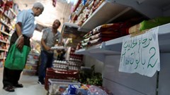 Empty shelves and rising prices test Tunisians' patience