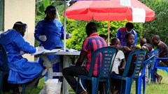Source: Reuters. Ugandan health workers speak to members of the community before carrying out the first vaccination exercise against the ebola virus in Kirembo village.