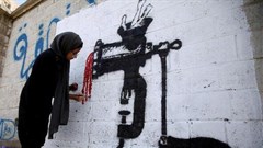 Source: Reuters. An artist paints a mural as part of the &quot;cholera&quot; campaign to depict the suffering of cholera patients in Sanaa, Yemen; April 25, 2019.