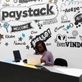 Source: Reuters. A staff member works at the reception of the paystack online payment company in the government reserved area in Ikeja, in Lagos, Nigeria, June 21, 2018.