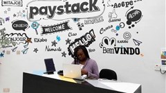 Source: Reuters. A staff member works at the reception of the paystack online payment company in the government reserved area in Ikeja, in Lagos, Nigeria, June 21, 2018.