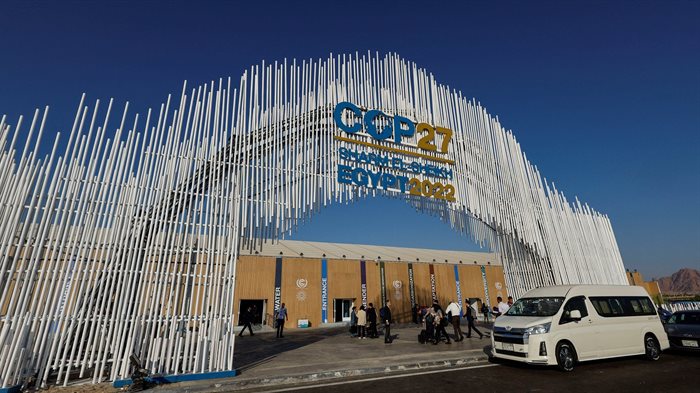 Participants walk outside of the Sharm El Sheikh International Convention Centre before the COP27 climate summit opening in Sharm el-Sheikh, Egypt. Source: Reuters/Mohammed Salem