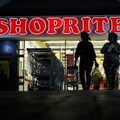Shoppers leave the Shoprite store in Daveyton, South Africa 23 May 2018. Reuters/Siphiwe Sibeko/File Photo