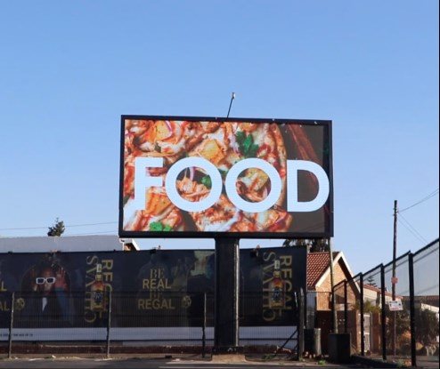 Cookout Sunday on a digital billboard at Konka Day Club in Pimville, Soweto