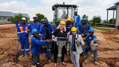 Reddford House The Hills groundbreaking - Ronel Burger and Grant Ferreira with the construction crew