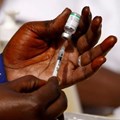 Source: Reuters. A health worker prepares a dose of the coronavirus disease (Covid-19) vaccine in Dakar, Senegal February 23, 2021.