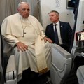 Pope Francis addresses the media while aboard the plane from Juba to Rome, returning from his visit to Democratic Republic of Congo and South Sudan, 5 February 2023. Vatican Media/­Handout via Reuters
