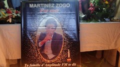 Cameroon journalist Martinez Zogo's photo is displayed as fellow journalists pay their last respect to him. Source: Reuters/Amindeh Blaise Atabong.