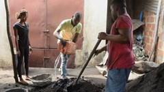 Roland Adjovi, a producer of Ecolo coal, transforms plant waste into bio charcoal at his workshop in Cotonou, Benin, 27 January 2023. Reuters/Charles Placide Tossou