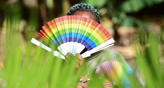 File photo: Quin Karala, 29, a member of the lesbian, gay, bisexual, transgender, intersex and queer (LGBTQ) community and a single mother of one poses for a picture with rainbow colours at the offices of Rella Women's Empowerment Program, for LGBTQ rights advocacy, after a Reuters interview in Kulambiro suburb of Kampala, Uganda 4 April 2023. Reuters/Abubaker Lubowa/File Photo