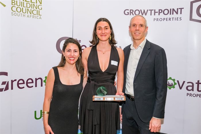 Georgina Smit, GBCSA head of technical, and Grahame Cruickshanks, Growthpoint head of sustainability and utilities, with last year's first prize winner in Engineering Greenovation, Anna Pamela Reid, University of Cape Town