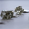 Botswana president insists on bigger share of diamonds from De Beers venture
