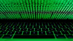 File photo: A computer keyboard lit by a displayed cyber code is seen in this illustration picture taken on 1 March 2017. Reuters/Kacper Pempel/Illustration/File Photo