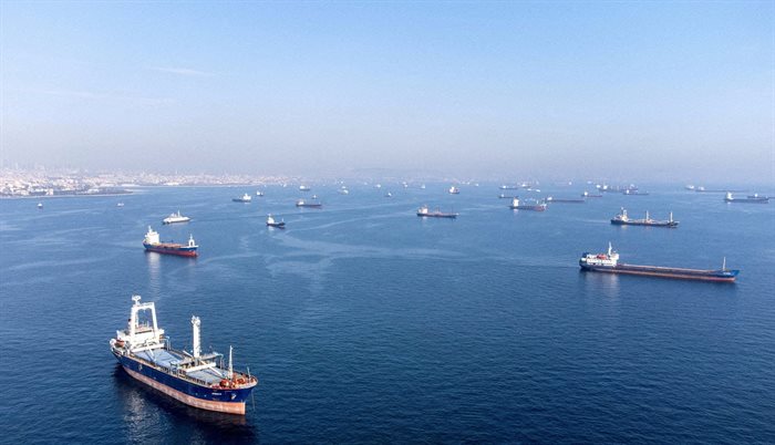 Commercial vessels wait to pass the Bosphorus strait off the shores of Yenikapi during a misty morning in Istanbul, Turkey. Source: Reuters/Umit Bektas
