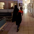 Source: Reuters. A woman walks with her child in the paediatric emergency unit at the Edward Francis Small teaching hospital in Banjul, Gambia, November 4, 2022.