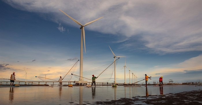 Fishermen catching near windfarms. Source: Tran le Tuan/Pexels