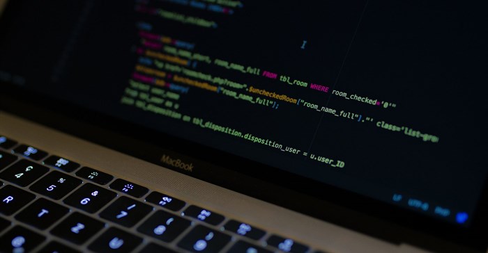 Coding SQL Query in a PHP file using Atom. Source: Caspar Camille Rubin/Unsplash
