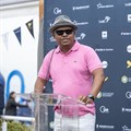 Source: Gallo Images Sbu Sitole, Loeries chair, in white pants and a pink golf shirt, welcomes delegates to the Mayor's Brunch